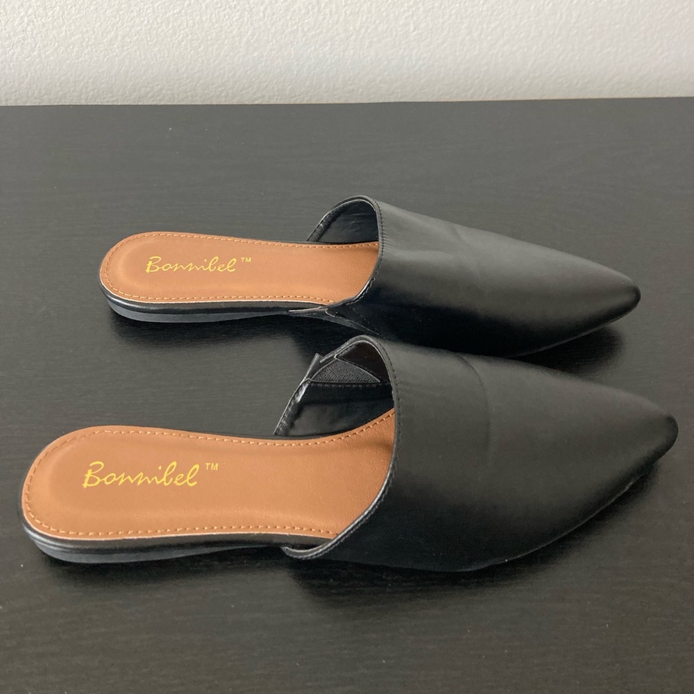 Black faux leather flats